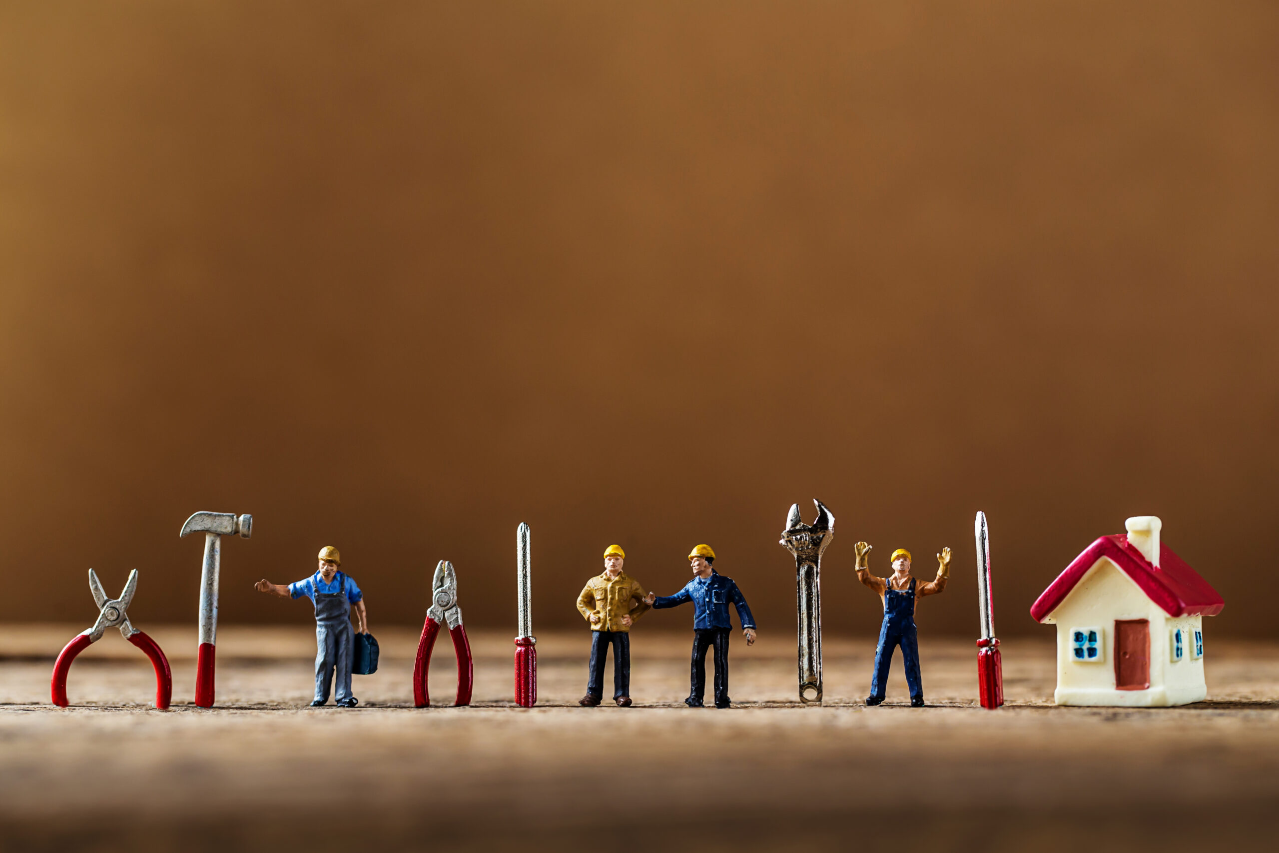 Selective,Focus,Of,Miniature,Worker,Working,With,Tool,Tools,Supplies